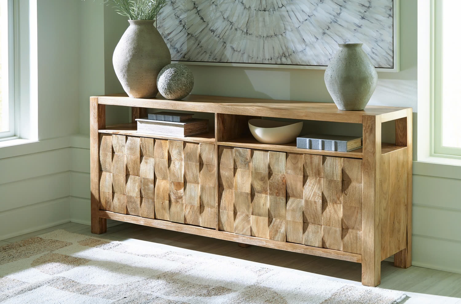 Hudwick accent cabinet styled with neutral ceramics and wall art