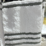 Green & white plush bath mat